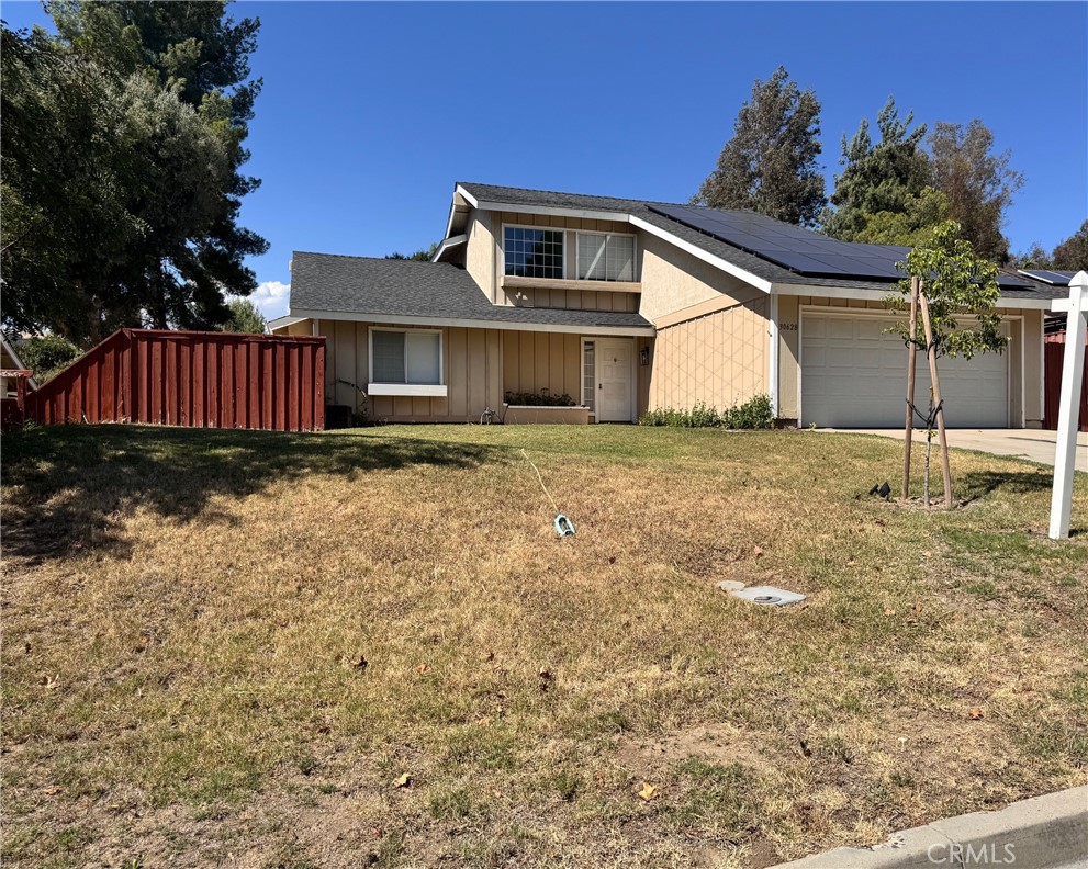 30628 Moontide Court Temecula, CA 92592 - Photo 4 of 53 a front view of a house with yard and trees