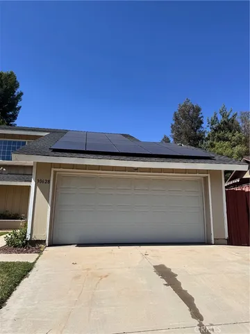 a view of swimming pool with seating space
