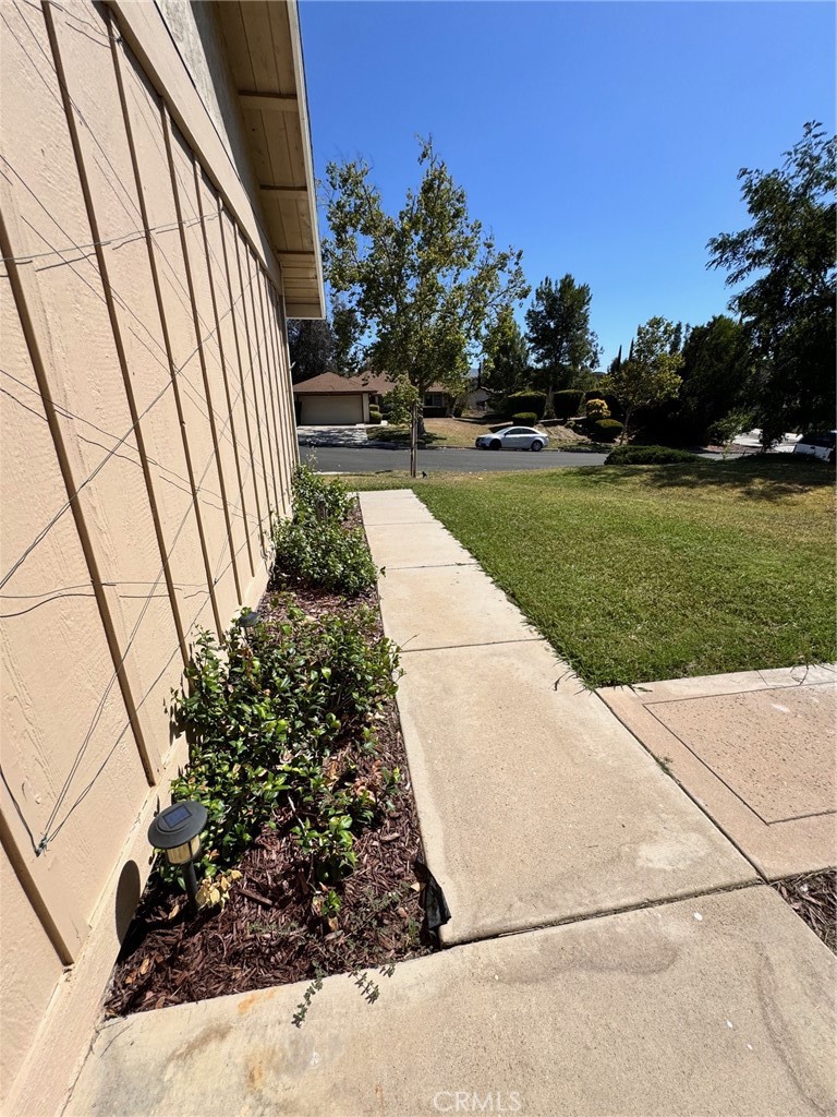 30628 Moontide Court Temecula, CA 92592 - Photo 52 of 53 a view of a garden with pathway