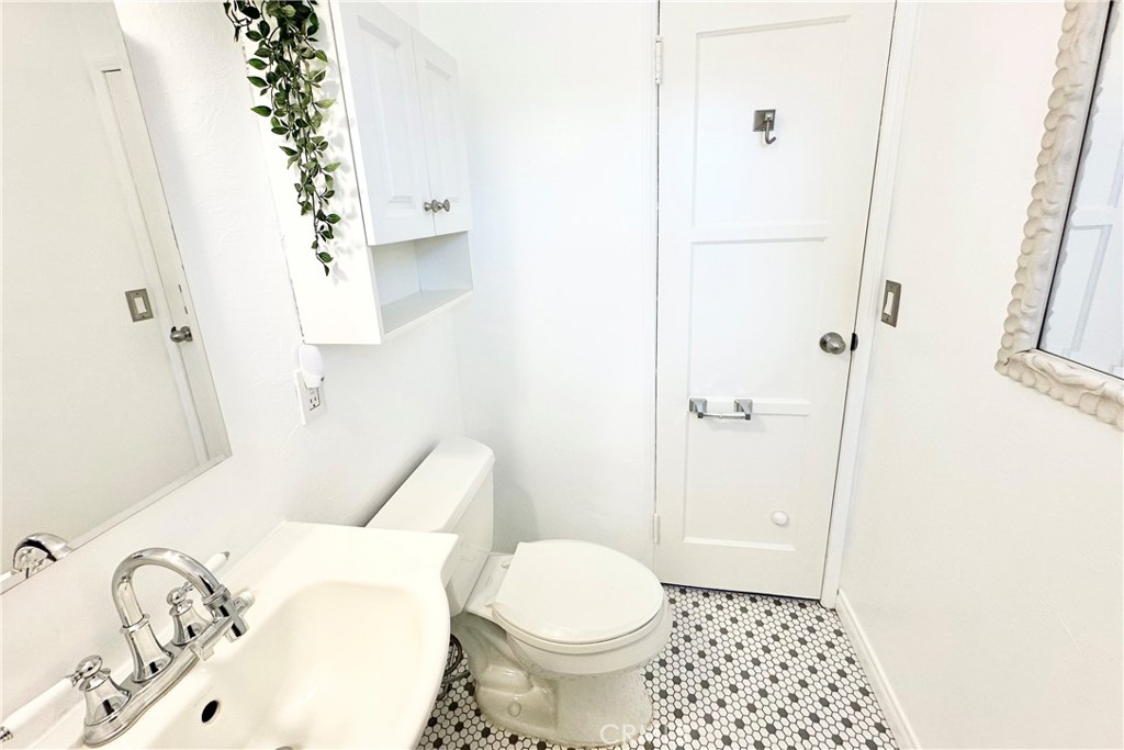 4290 Oakwood Place Riverside, CA 92506 - Photo 12 of 41 a bathroom with a toilet and a shower