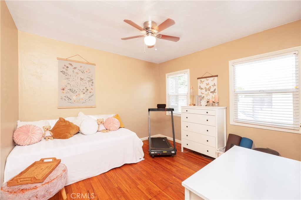 4290 Oakwood Place Riverside, CA 92506 - Photo 13 of 41 a bedroom with a bed and a window