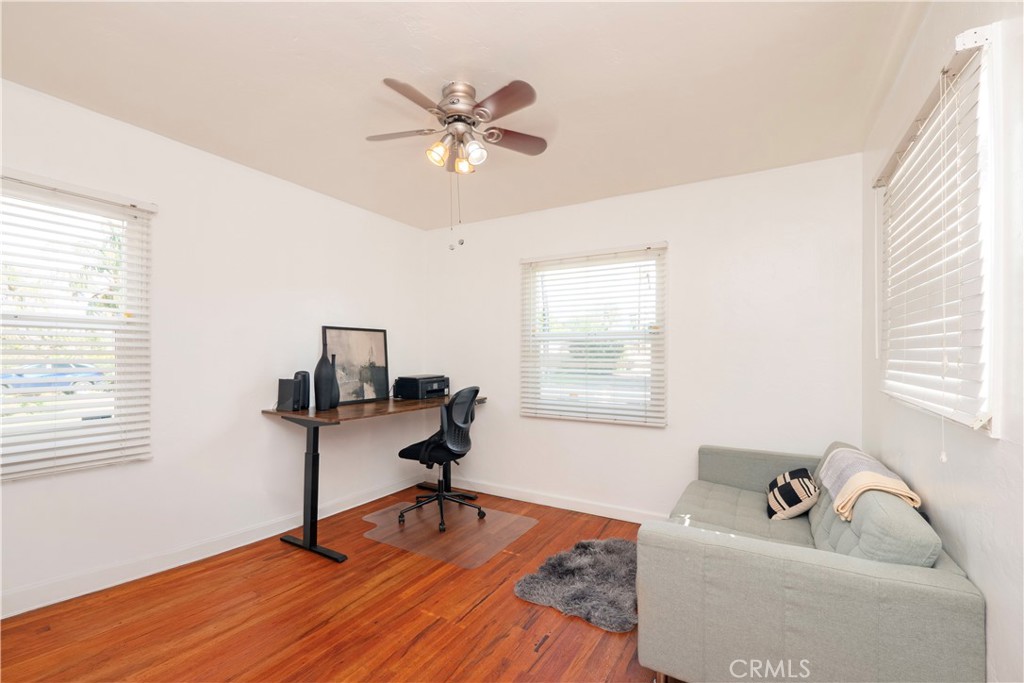 4290 Oakwood Place Riverside, CA 92506 - Photo 16 of 41 a living room with furniture and a window