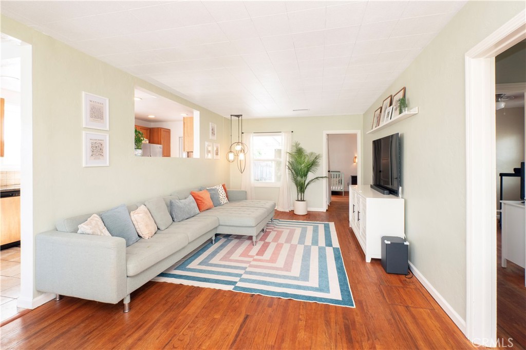 4290 Oakwood Place Riverside, CA 92506 - Photo 23 of 41 a living room with furniture and a flat screen tv