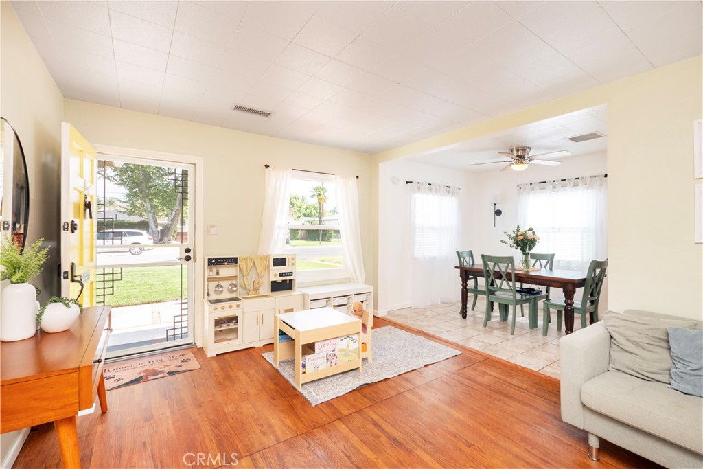 4290 Oakwood Place Riverside, CA 92506 - Photo 24 of 41 a living room with furniture and a wooden floor