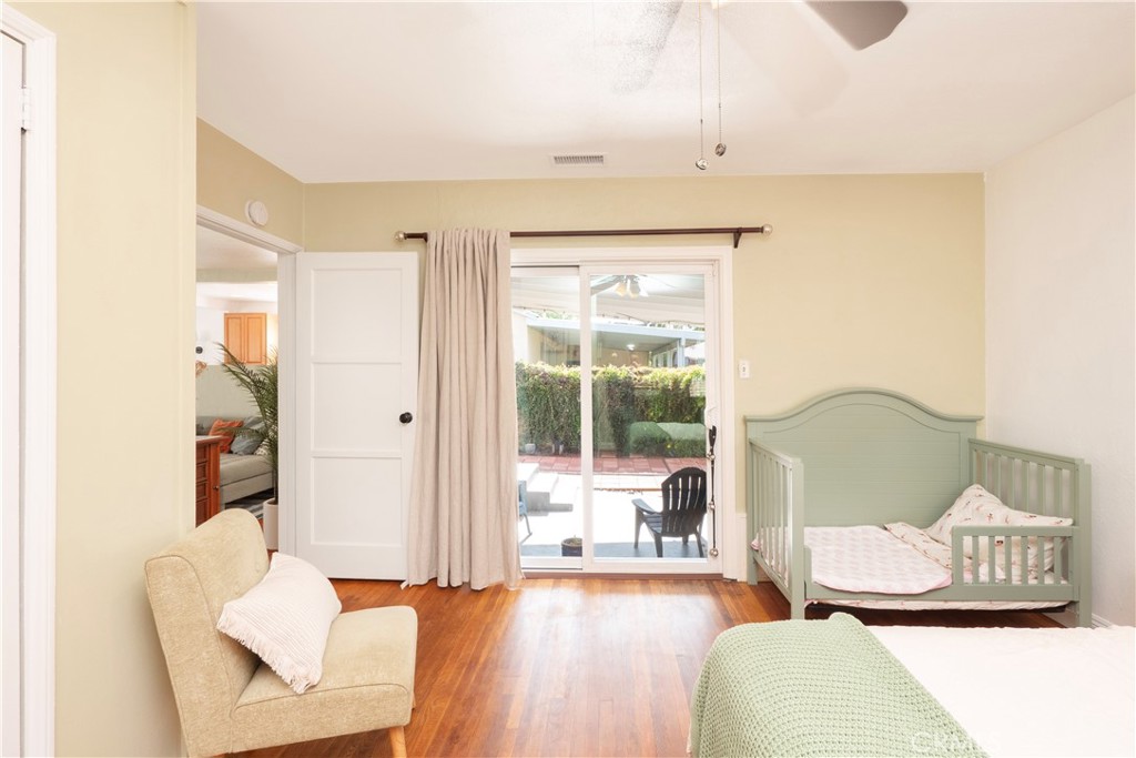 4290 Oakwood Place Riverside, CA 92506 - Photo 9 of 41 a living room with furniture and a large window