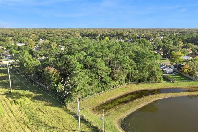 a view of a yard with an outdoor space