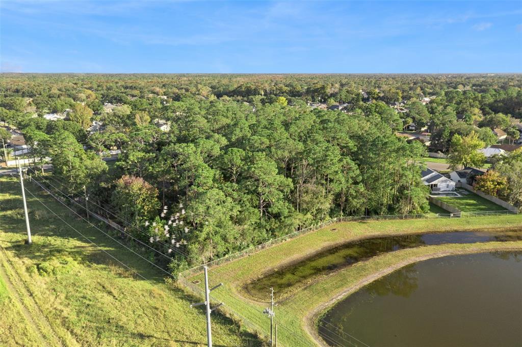 Percival Road Orlando, FL 32826 - Photo 3 of 9 a view of a yard with an outdoor space