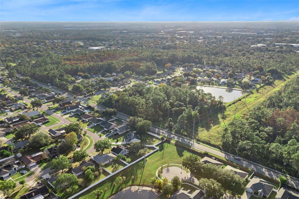 Percival Road Orlando, FL 32826 - Photo 7 of 9 an aerial view of residential houses with outdoor space