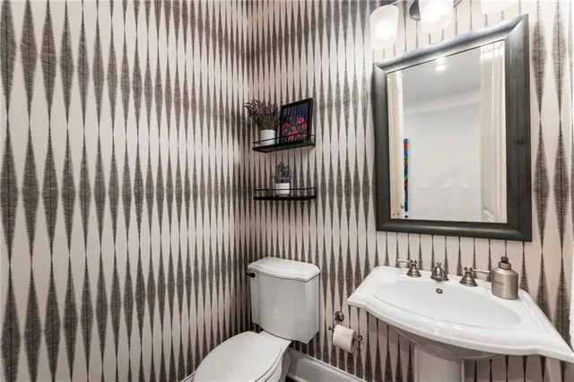 a bathroom with a sink and a toilet