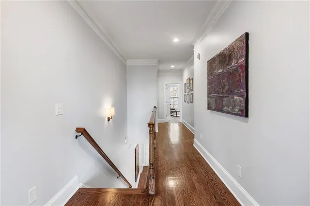 a view of a hallway with staircase