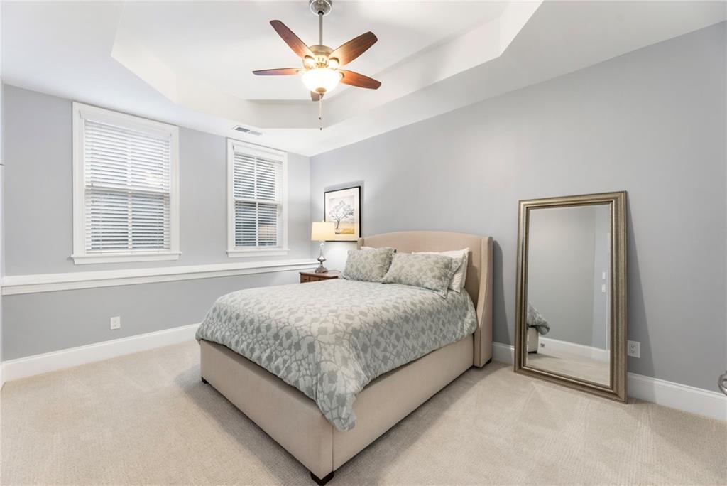 3611 Habersham Road Northwest Atlanta, GA 30305 - Photo 38 of 44 a bedroom with a bed and a window