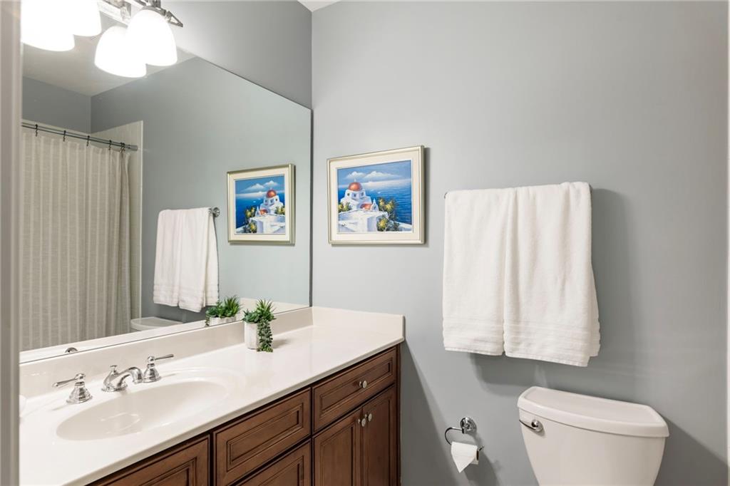 3611 Habersham Road Northwest Atlanta, GA 30305 - Photo 41 of 44 a bathroom with a sink vanity granite and toilet