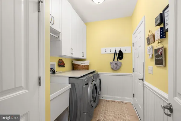 a view of a livingroom with a kitchen