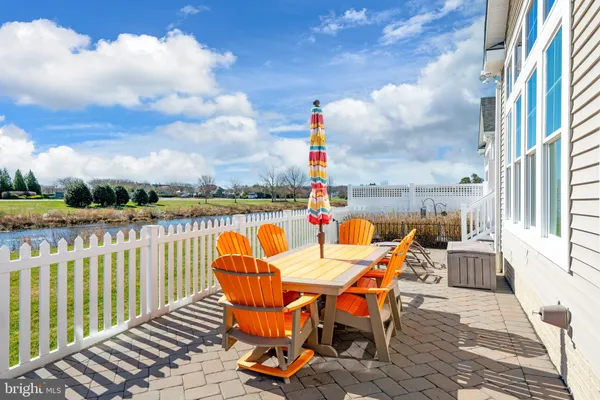 a view of a brick house with a ocean view