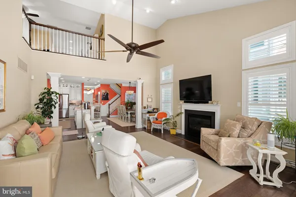a living room with furniture and windows