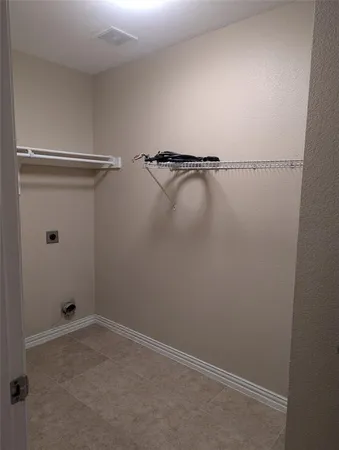 a view of small space with racks on the wall