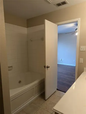 a bathroom with a bathtub