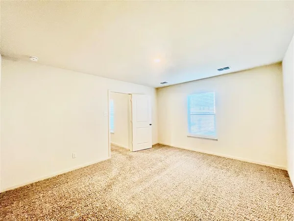 an empty room with a natural light