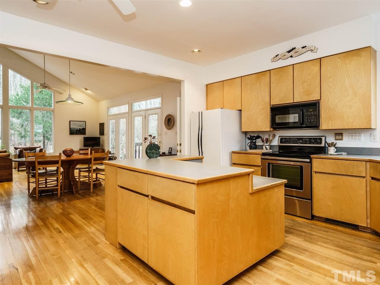 371 River Road Pittsboro, NC 27312 - Photo 7 of 25 All appliances convey with the sale of this home. The custom pantry is an added bonus!