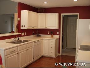 249 Planters Creek Road Fletcher, NC 28732 - Photo 6 of 12 a bathroom with a sink a mirror and a vanity