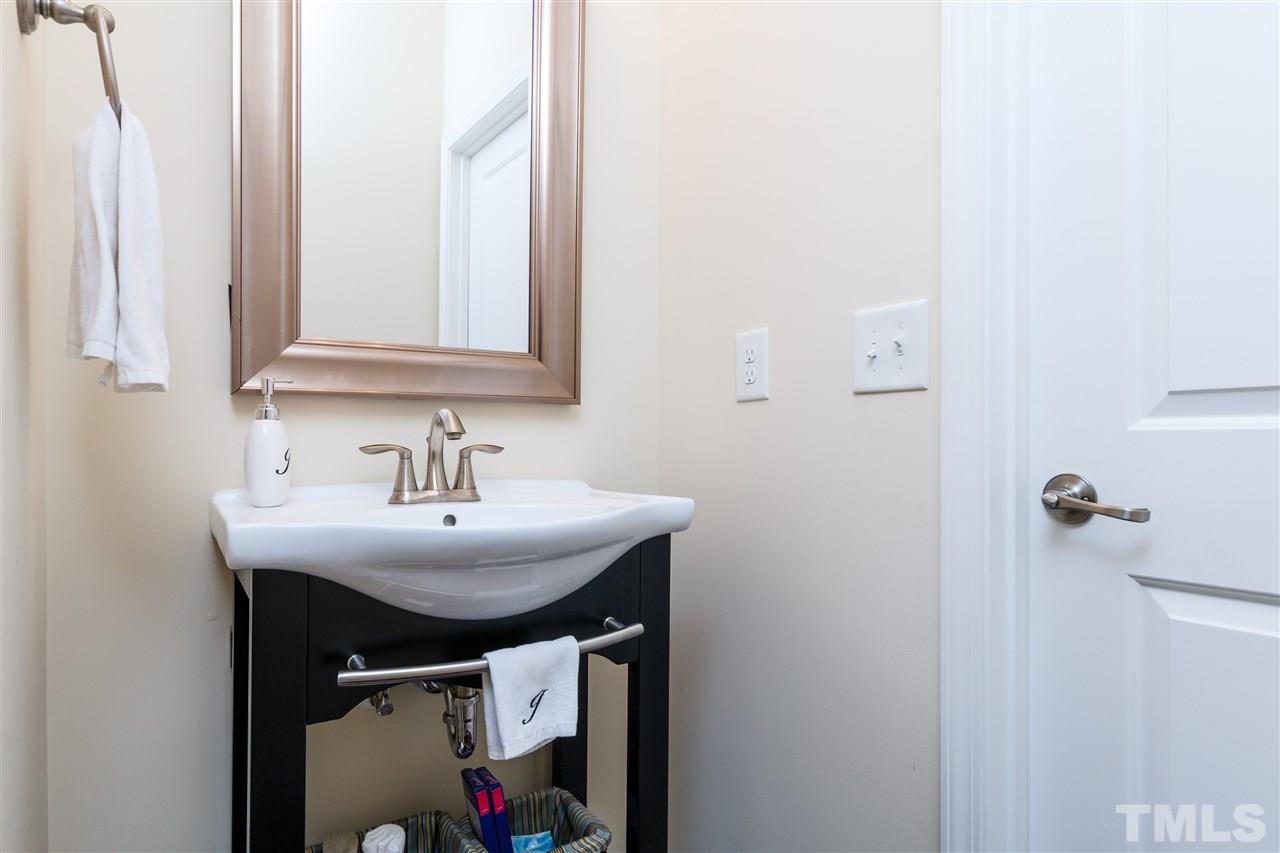 1305 Rodessa Run Raleigh, NC 27607 - Photo 15 of 25 Half bath on the second floor is convenient and also perfect for guests to use.