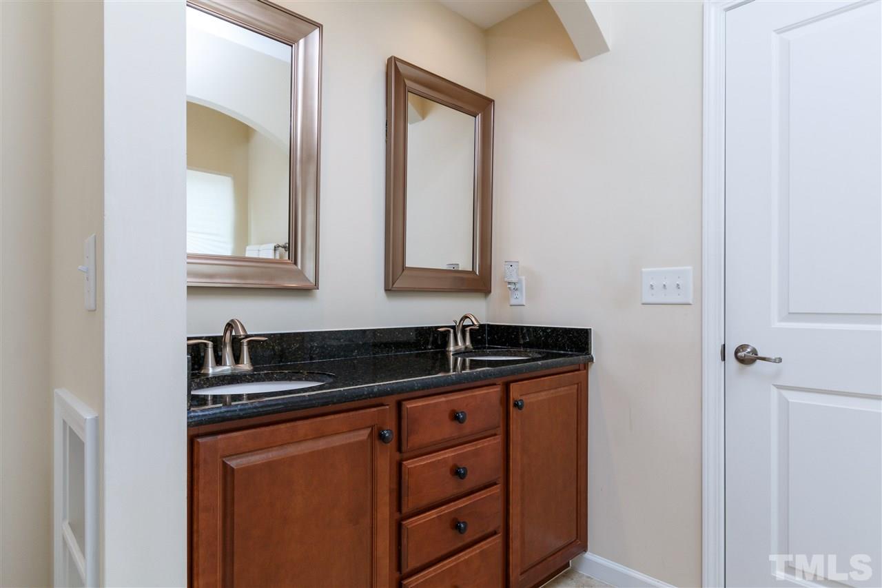 1305 Rodessa Run Raleigh, NC 27607 - Photo 19 of 25 Enjoy this master bathroom with garden tub, walk in shower, double sinks.