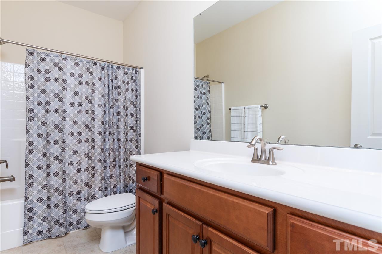 1305 Rodessa Run Raleigh, NC 27607 - Photo 22 of 25 Another full bath upstairs that is perfect for the secondary bedrooms to share!