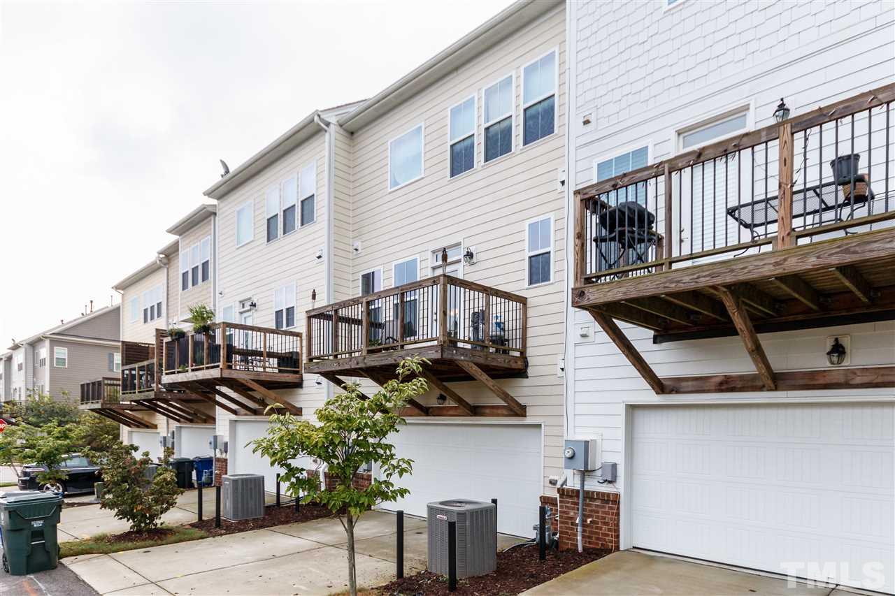 1305 Rodessa Run Raleigh, NC 27607 - Photo 25 of 25 You'll love pulling into your two car garage on the private alley way as well as the spacious balcony on the second floor of this home!