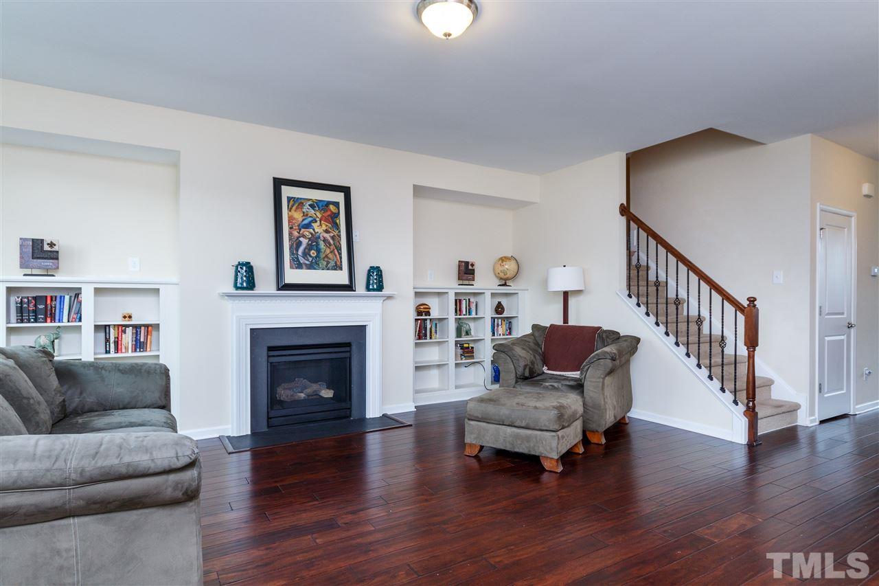 1305 Rodessa Run Raleigh, NC 27607 - Photo 8 of 25 You'll love the fireplace and bookshelves are perfect to decorate or use as storage space!