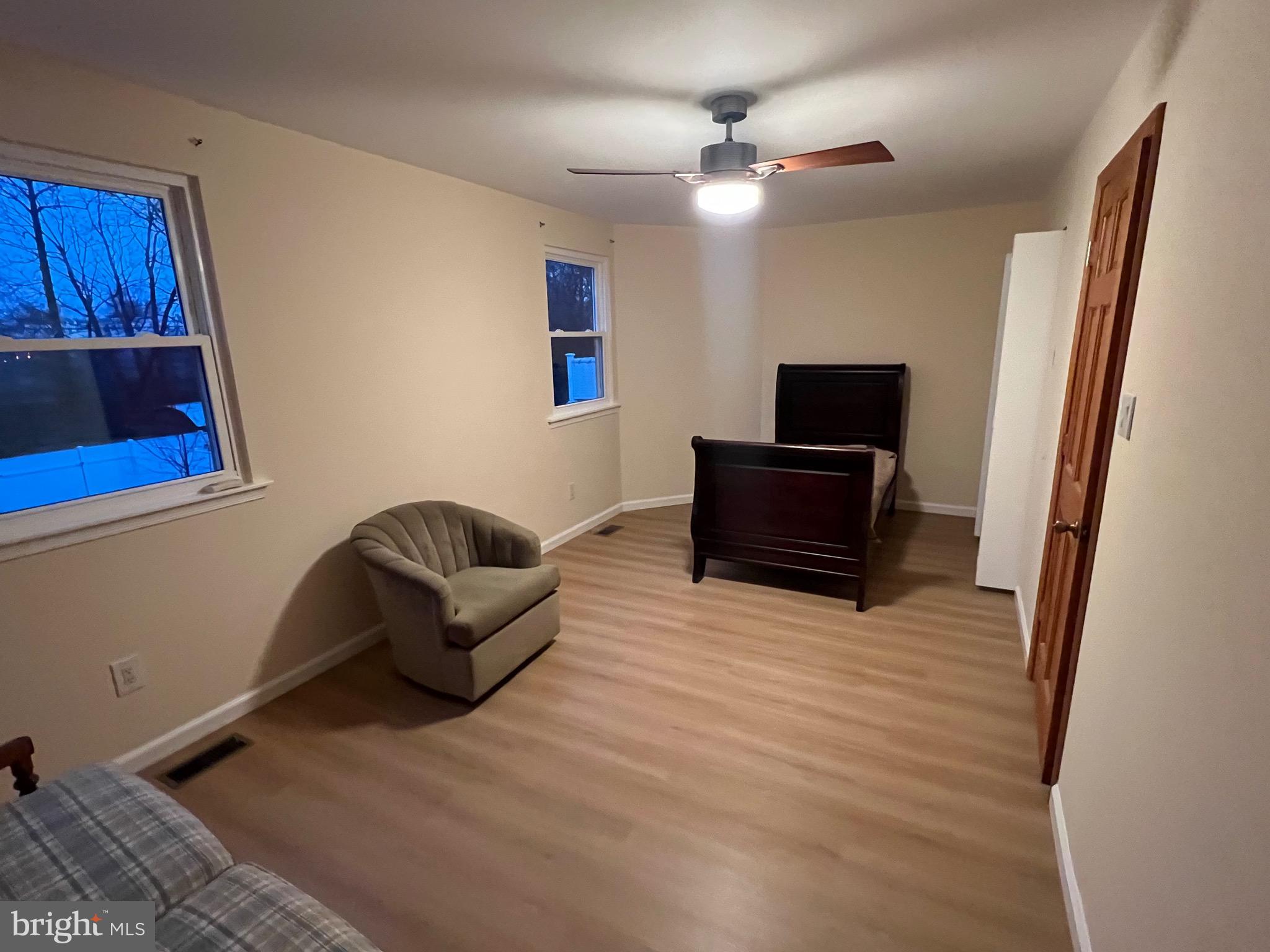 10202 Murty Lane Philadelphia, PA 19116 - Photo 7 of 8 a living room with furniture and a flat screen tv
