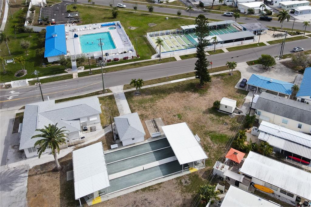 10315 Cortez Road West, Unit 44 Bradenton, FL 34210 - Photo 11 of 12 an aerial view of a house with garden space and street view