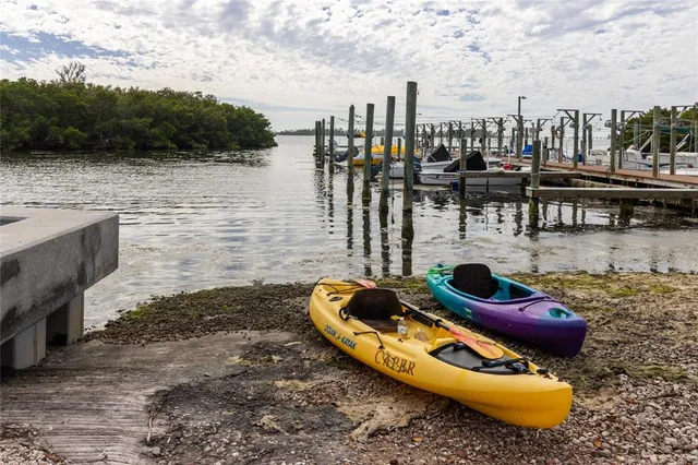 a view of a lake with a car parked