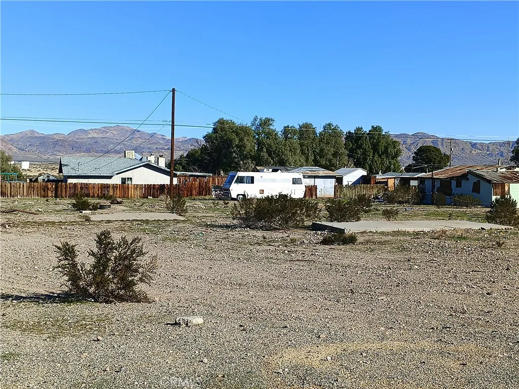 10 Santa Fe Street Daggett, CA 92327 - Photo 5 of 7 a view of a town with big tree