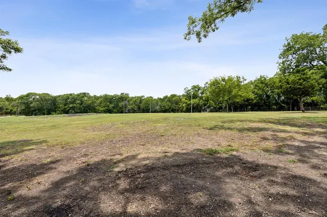 a view of outdoor space with green field
