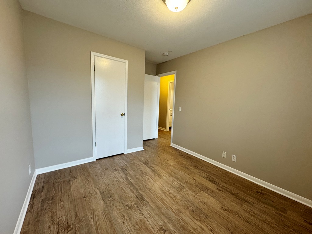 219 Crystal Knoll Boulevard Georgetown, TX 78626 - Photo 22 of 32 a view of empty room with wooden floor