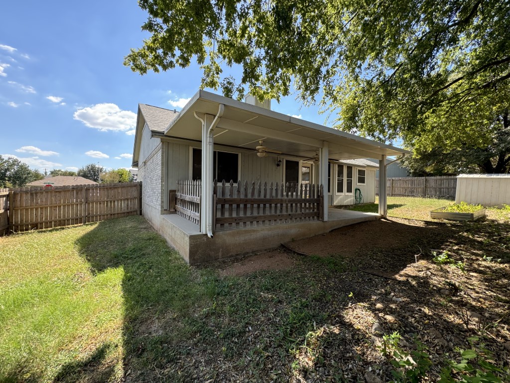219 Crystal Knoll Boulevard Georgetown, TX 78626 - Photo 29 of 32 a view of a house with a yard