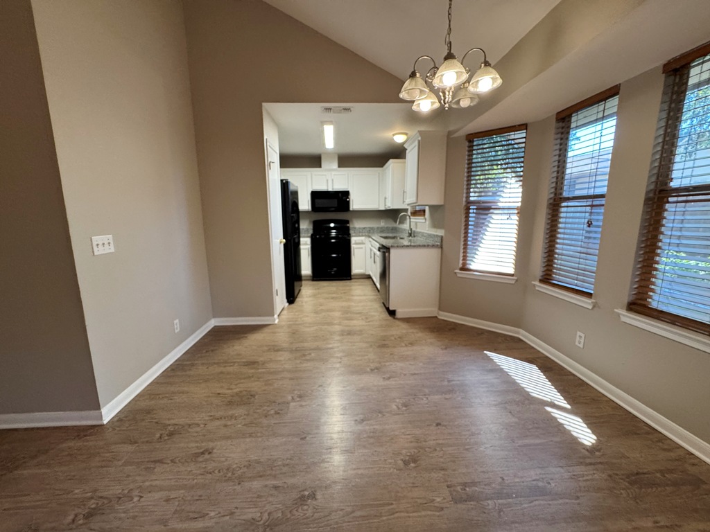 219 Crystal Knoll Boulevard Georgetown, TX 78626 - Photo 4 of 32 a view of a kitchen with stove and cabinets