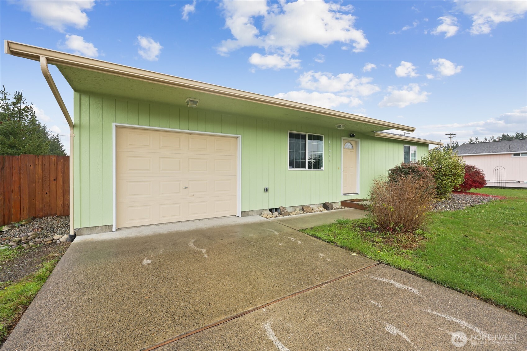 17932 Camus Drive Southwest Rochester, WA 98579 - Photo 2 of 28 a front view of a house with garden