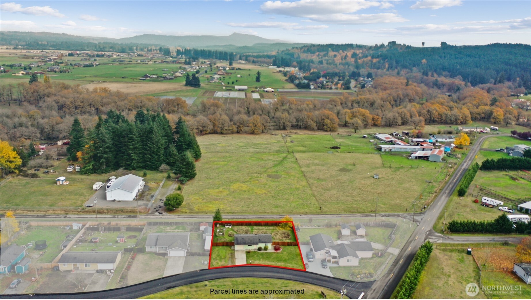 17932 Camus Drive Southwest Rochester, WA 98579 - Photo 28 of 28 an aerial view of a house with a yard lake view and mountain view