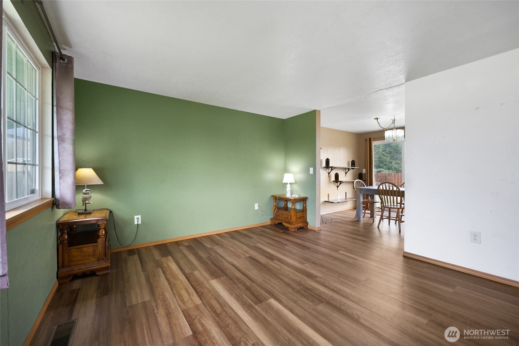 17932 Camus Drive Southwest Rochester, WA 98579 - Photo 4 of 28 a view of empty room with wooden floor