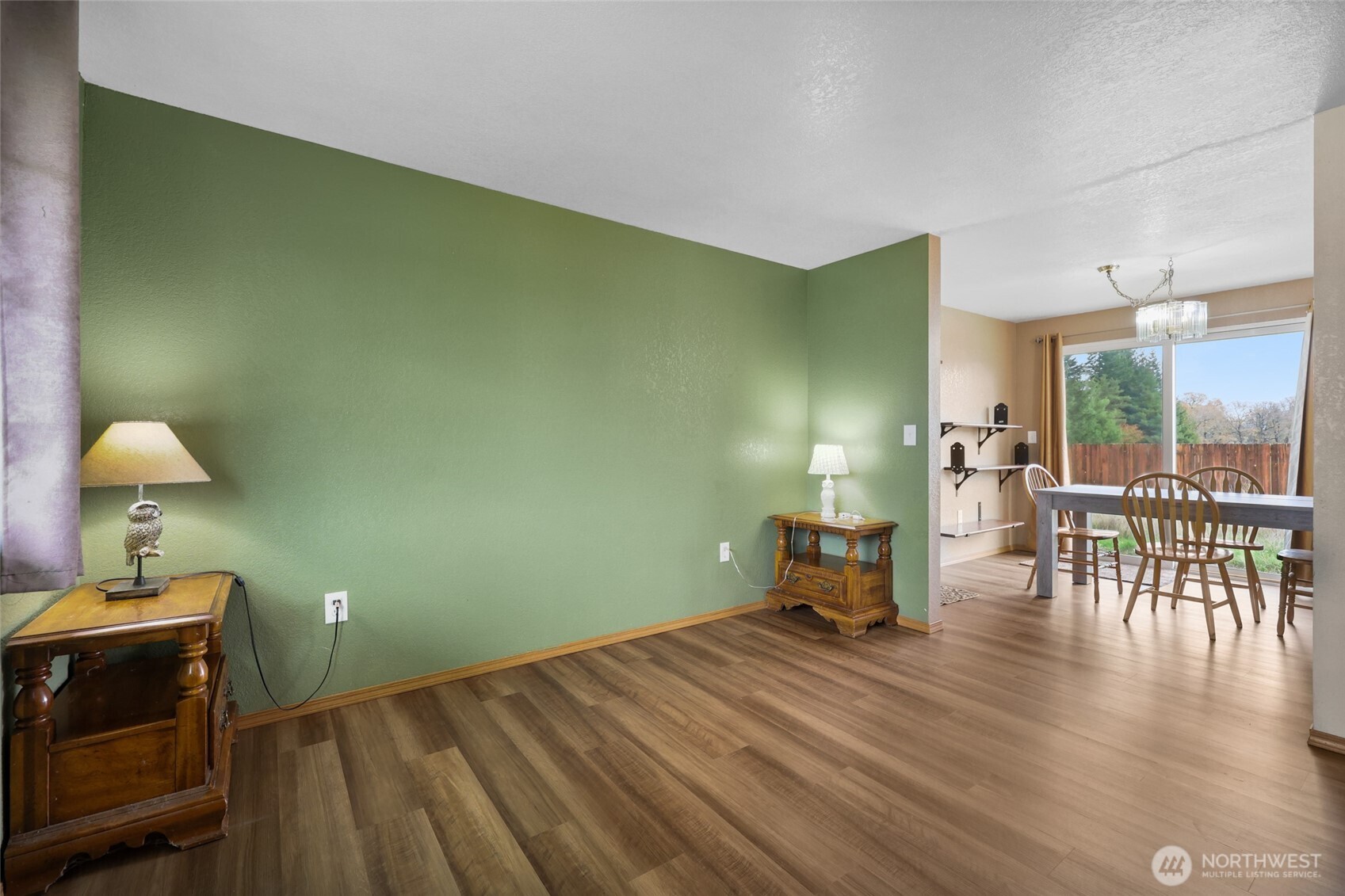 17932 Camus Drive Southwest Rochester, WA 98579 - Photo 6 of 28 a bedroom with a bed and a table