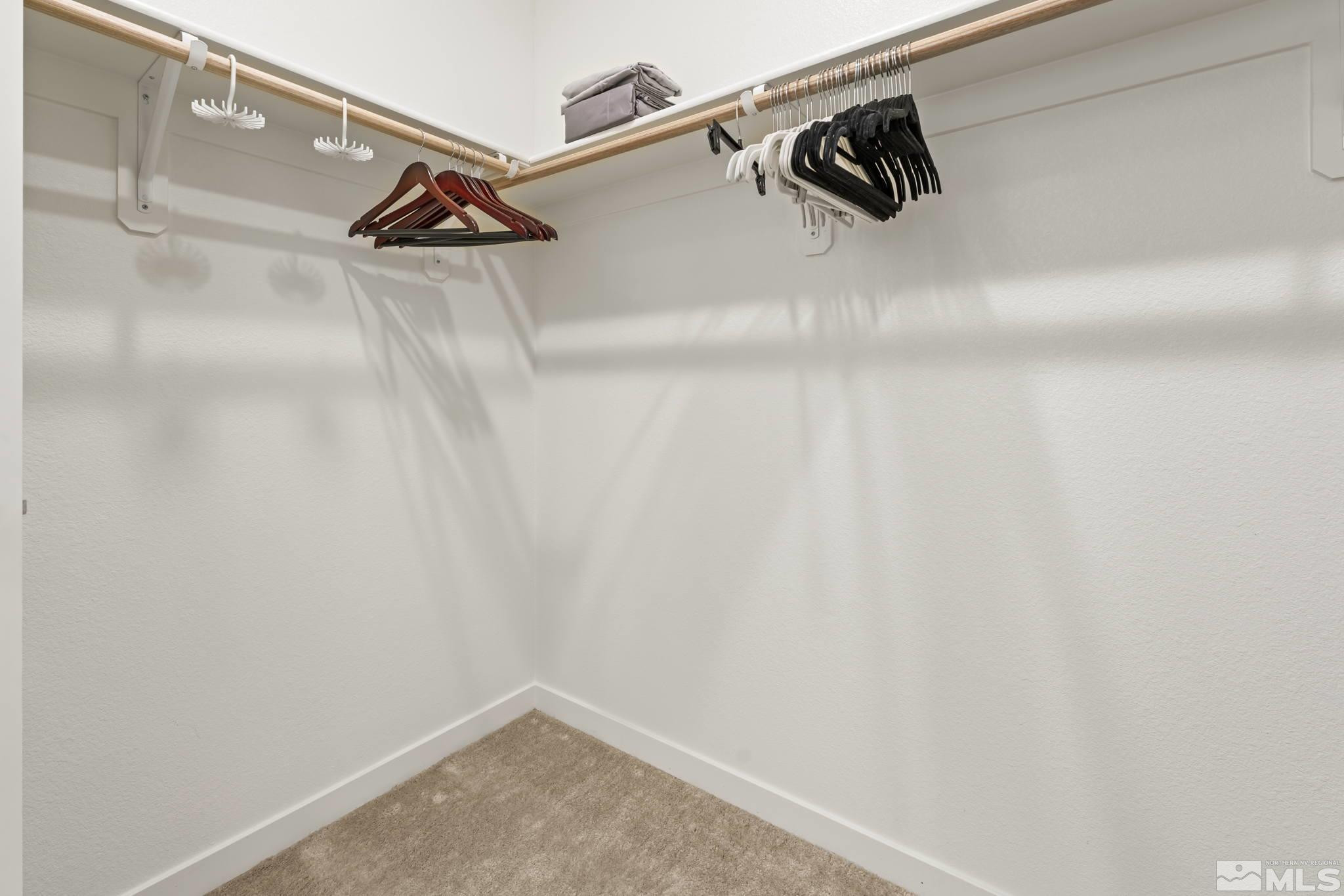 4928 Black Falcon Way Sun Valley, NV 89433 - Photo 16 of 32 a view of walk in closet