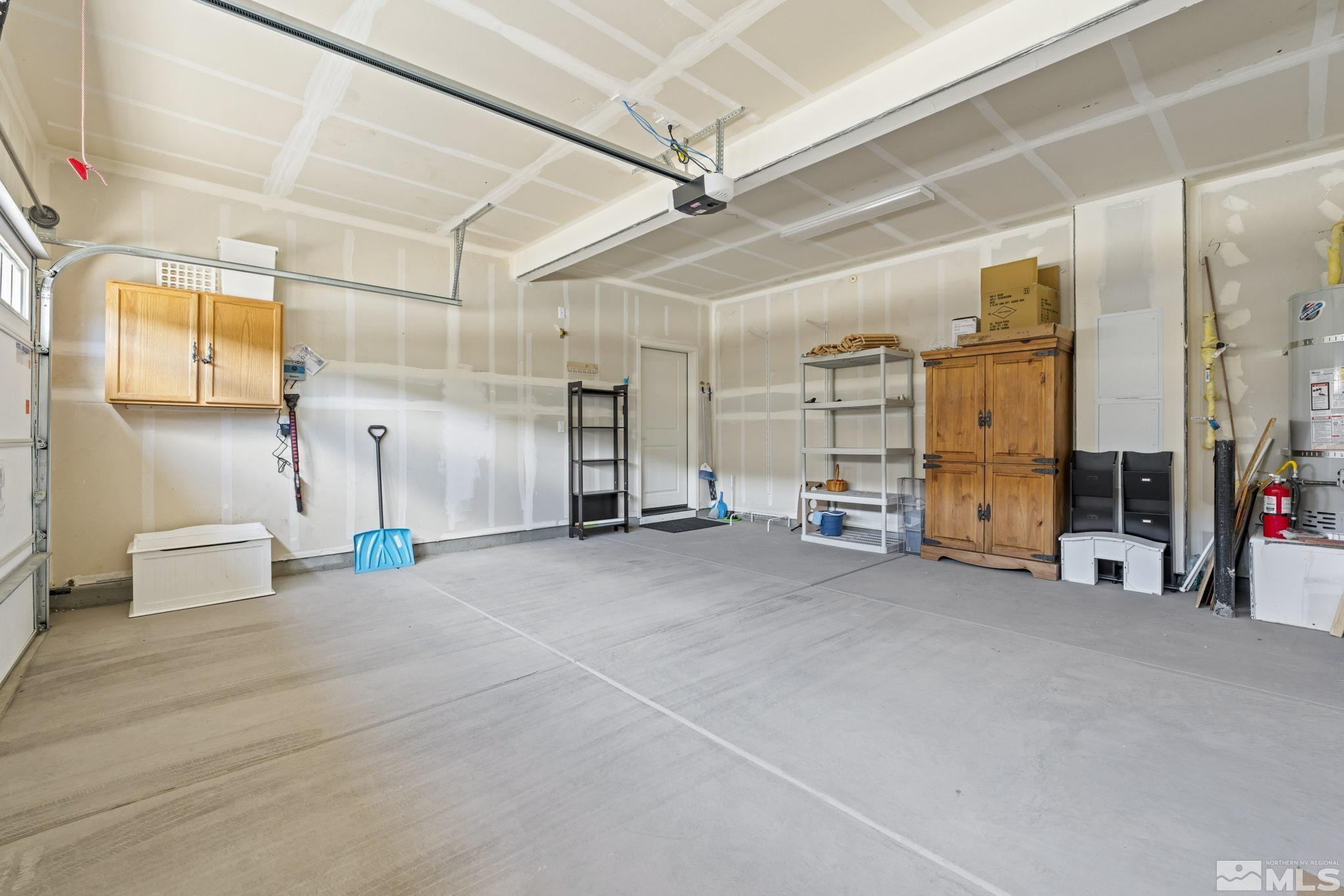 4928 Black Falcon Way Sun Valley, NV 89433 - Photo 25 of 32 a view of a storage & utility room