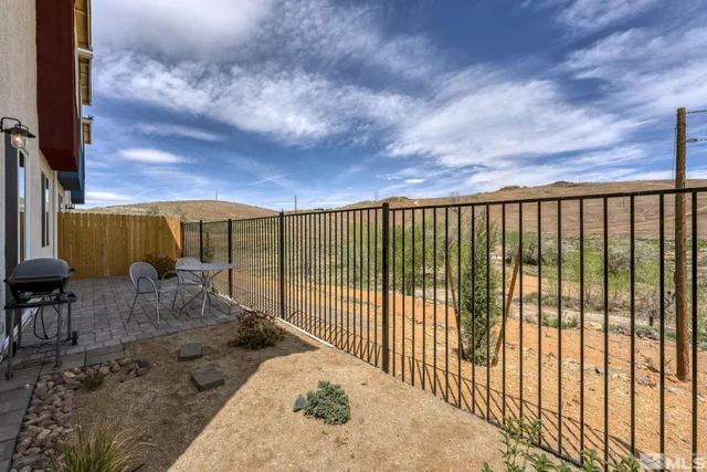 a view of balcony with wooden floor