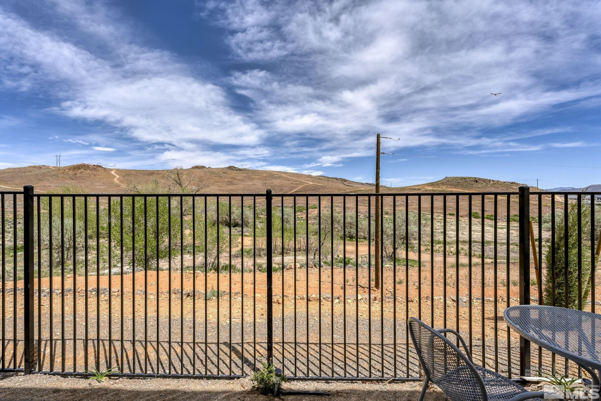 4928 Black Falcon Way Sun Valley, NV 89433 - Photo 28 of 32 a view of a black gate