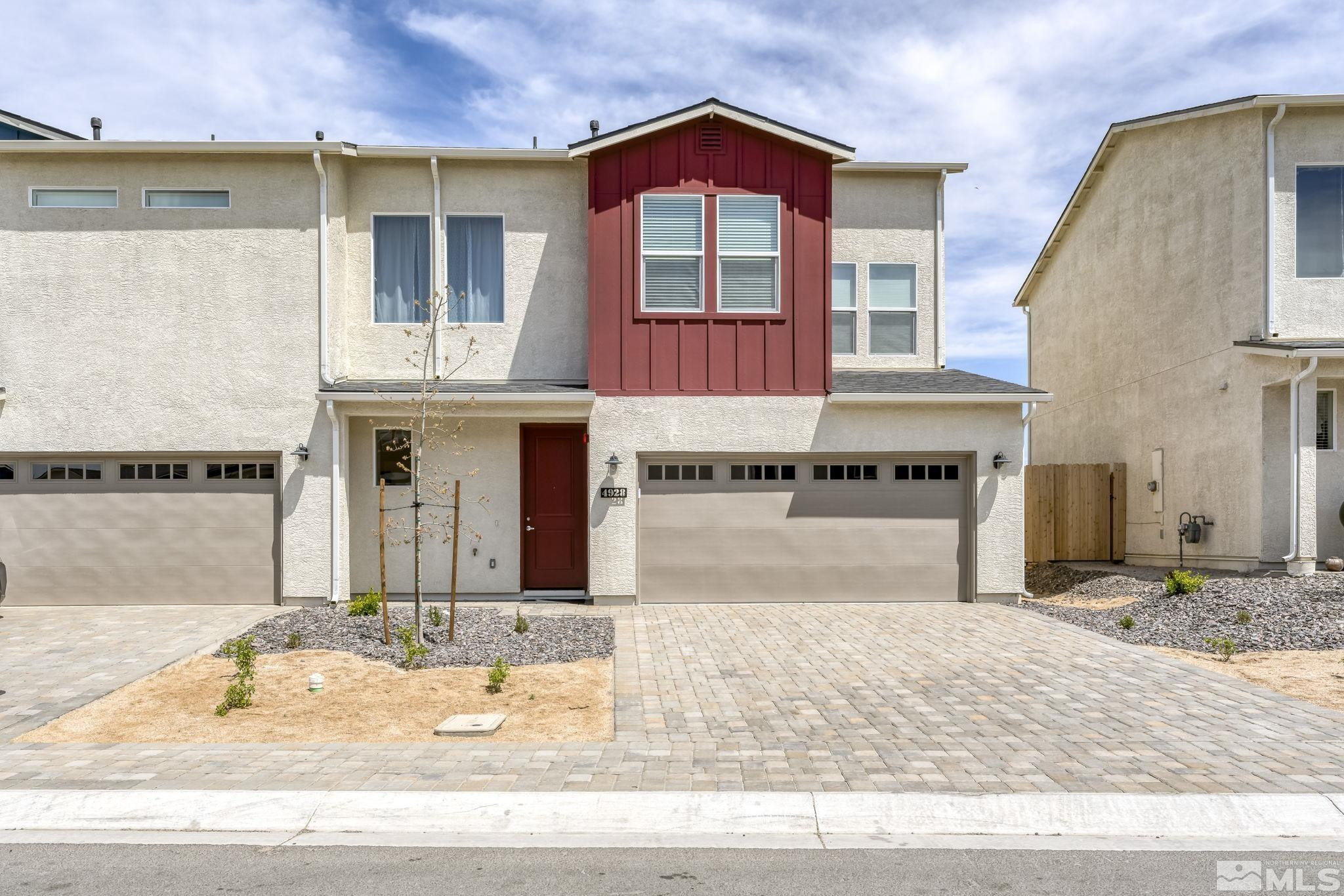 4928 Black Falcon Way Sun Valley, NV 89433 - Photo 31 of 32 a view of a kitchen with granite countertop a sink and a stove