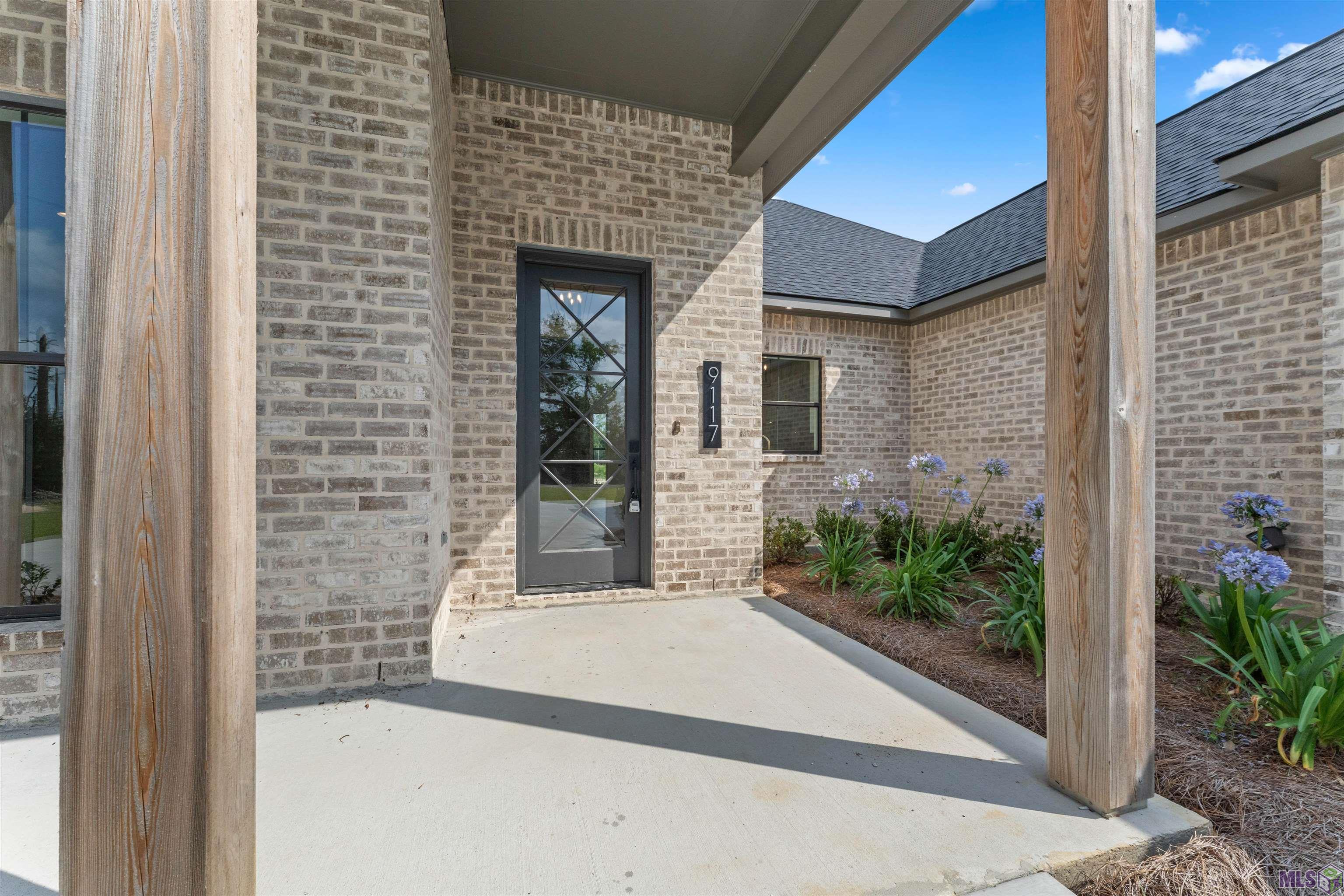 9117 Hillon Hood Road Denham Springs, LA 70726 - Photo 3 of 47 4 BEDROOMS and 3 FULL BATHS and 1 POWDER BATH