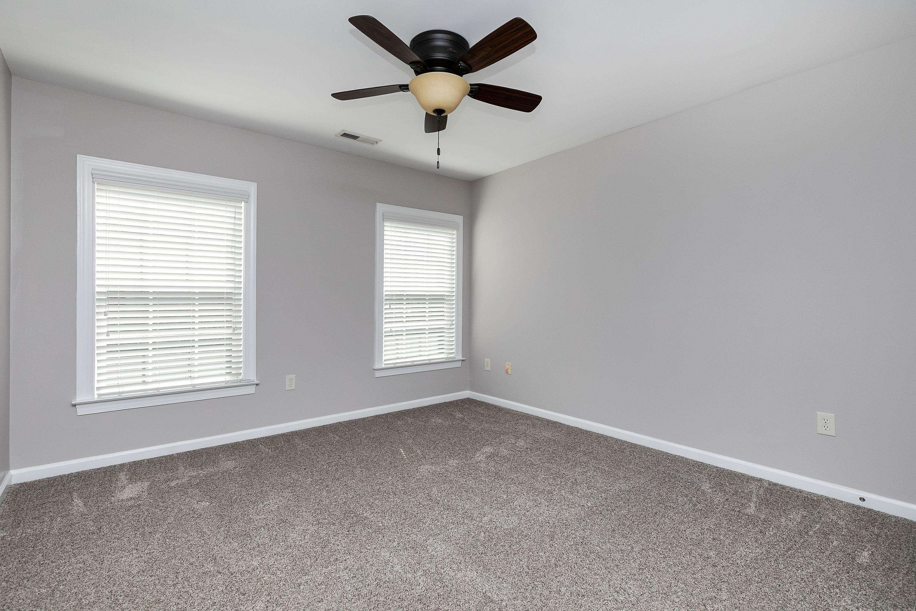 8431 Henderson Road Apex, NC 27539 - Photo 35 of 56 a view of an empty room with a window