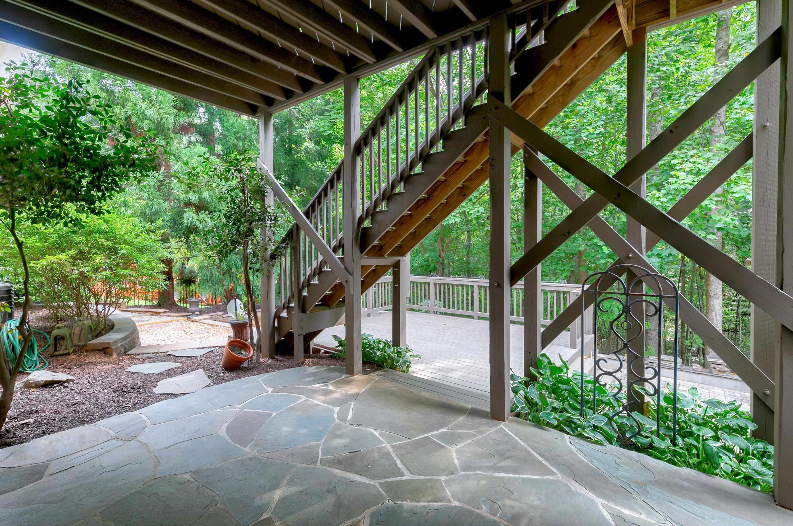 8431 Henderson Road Apex, NC 27539 - Photo 46 of 56 a view of outdoor space and deck