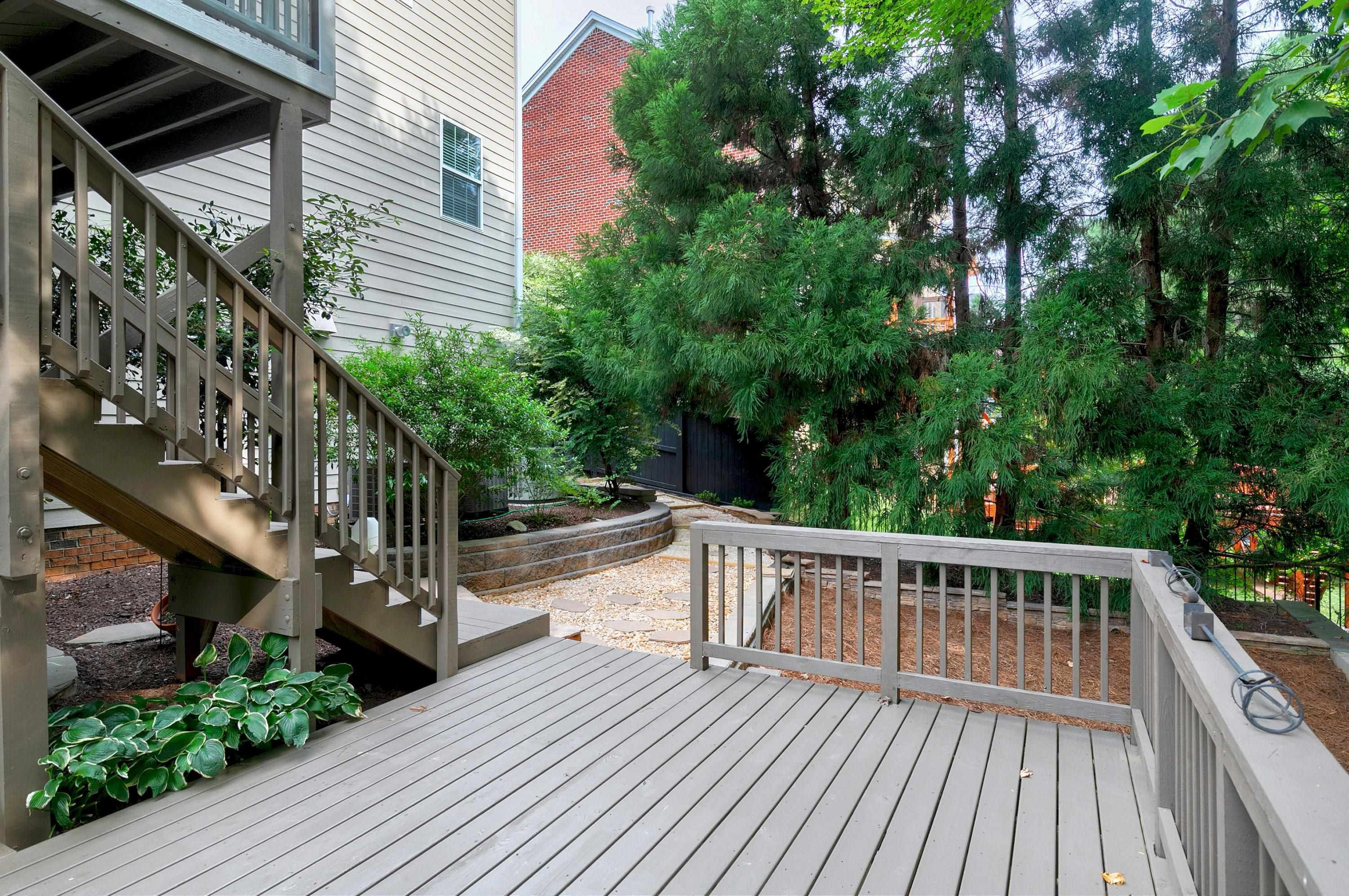 8431 Henderson Road Apex, NC 27539 - Photo 47 of 56 a view of balcony with wooden floor and fence
